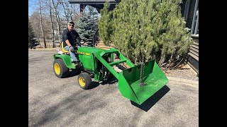 Little Buck Loader on a John Deere 317 in Canada