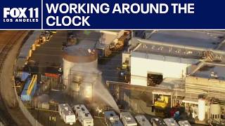 Crews working to eliminate threat of massive explosion