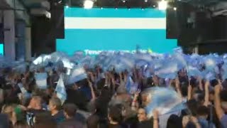 Supporters of Argentina's Massa celebrate partial poll results | AFP