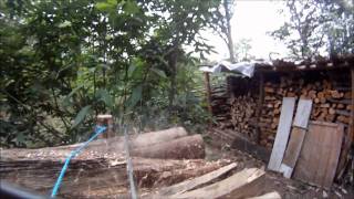 Chainsaw cam (GoPro) - cutting up a stack of logs with a Husqvarna 570