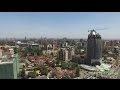 Epic Aerial of Nairobi city center in day/night and roads around