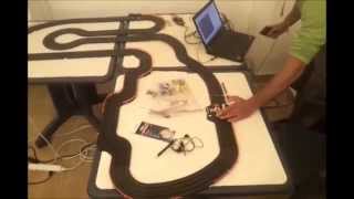 Slot car racer controlled by DVS Capo Caccia 2014