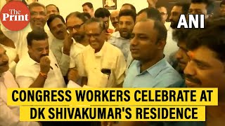 Congress workers celebrate at DK Shivakumar's residence in Bengaluru, Karnataka