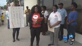 Portsmouth residents gather outside city hall to demand better flood plan