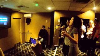 Rachelle Ann Go and Eva Noblezada singing  Chandelier