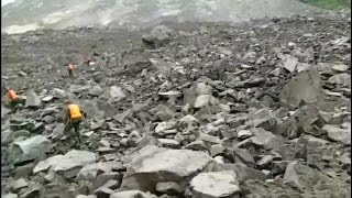 More than 100 missing after landslide in China