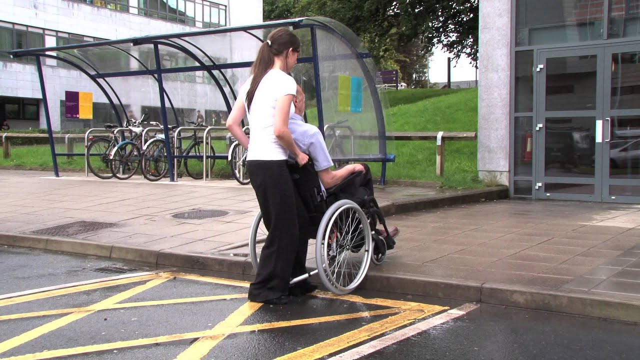 How To Use A Manual Wheelchair - Part 6 Moving Up And Down Kerbs - YouTube