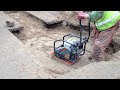 compacting sand in trench prior to stone addition