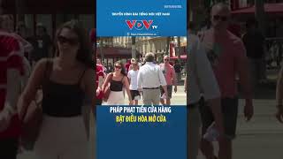Pháp phạt tiền cửa hàng bật điều hòa mở cửa