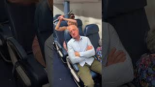 Woman climbs over seat on plane,#shorts #funny #lol