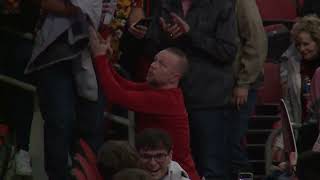 Louisville coach Pat Kelsey makes his way into the crowd to celebrate after win over Miami