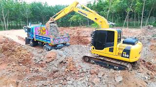 รถแม็คโครโคมัตสุขุดสระตักดินใส่รถหกล้อดั้มดิน (ทีมงานบุญรอด) Excavator KOMATSU PC130 \u0026 Dump Trucks