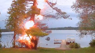 See dramatic moment powerful lightning strikes tree and ignites fire
