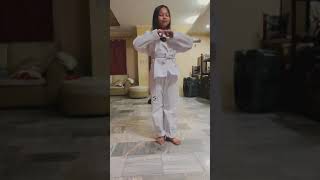 Practicing Taekwondo for yellow belt promotion