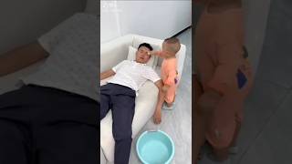 Little boy wash his sleeping father's face and foot #tiktok #viral #facts #ytshorts #shorts