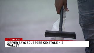 Baltimore couple robbed by squeegee kid with police stationed feet away