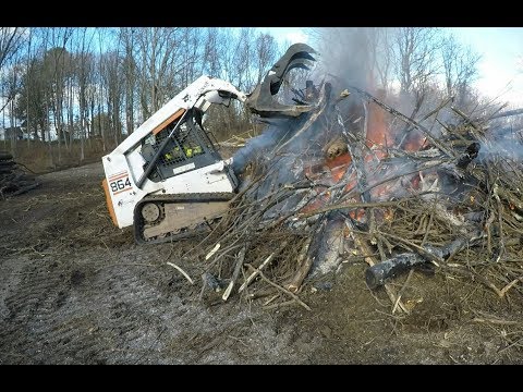 Burning a brush pile Burning a brush pile