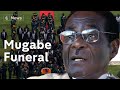 Robert Mugabe: dictator's coffin paraded through national sports ground