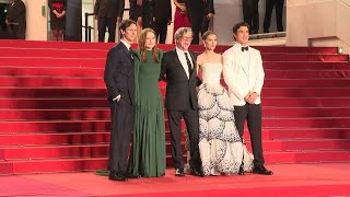 Natalie Portman and Julianne Moore walk the Cannes red carpet for "May December" | AFP