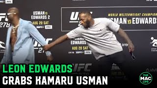 Leon Edwards grabs Kamaru Usman’s arm at UFC 278 face offs