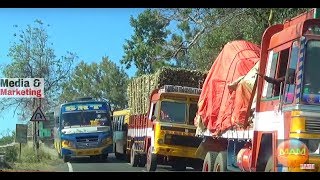 Lorry driver showing right hand signal to stop.. But PRIVATE BUS timely overtaking IN dhimbam ghats