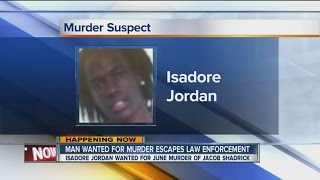 Search continues for murder suspect