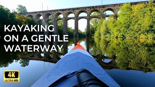 4K River Retreat: Relaxing Kayaking on a Gentle Waterway