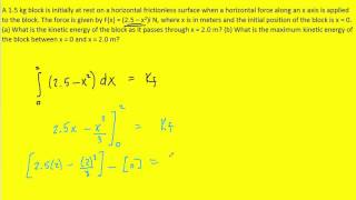 A 1.5 kg block is initially at rest on a horizontal frictionless surface