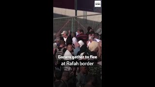 Gazans gather to flee at Rafah border
