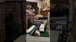 NYC Hudson 5334 crusing past downtown Ho Scale model train