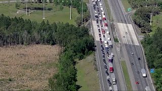 VIDEO: Traffic jam after Florida sets up I-95 coronavirus checkpoint at Georgia border