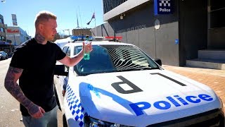 DOING VODKA OFF A POLICE CAR (arrested)