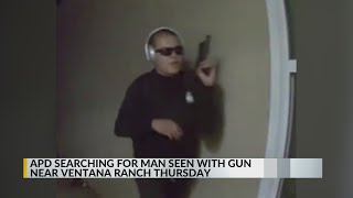 Albuquerque police searching for man seen on video knocking on doors while holding a gun