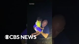Florida responders rescue child in floodwaters #shorts