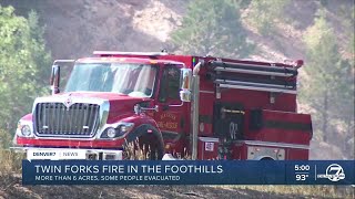 Wildfire shuts down US 285 near Indian Hills; multiple homes evacuated