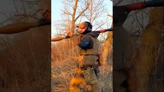 A Ukrainian serviceman striking an abandoned Russian AFV-footage date back to April #shorts #ukraine