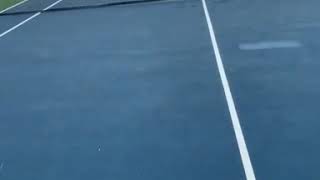 Noami Osaka playing tennis with her boyfriend rapper Cordae
