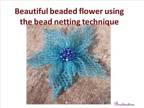 Beautiful beaded flower using the bead netting technique Beautiful beaded flower using the bead netting technique