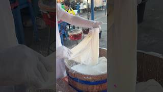 So sweet! Freshly made dragon's beard candy.