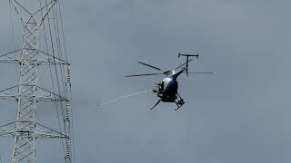 HV Powerline Insulator online Cleaning by a helicopter