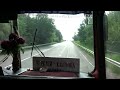 an old tourist bus ikarus 256 flies along a good road in ukraine. hungarian automobile industry