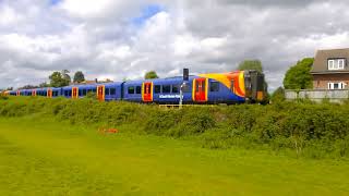 SWR's 450004 + 450102 on the 2S42 14:03 Weybridge to London Waterloo, near Chertsey on 20/05/22