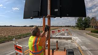 SUPER Windy, Arrow boards are being blown around! - Road Work Ahead