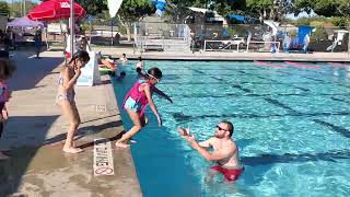 Swimming lesson for beginners at Culver City Municipal Pool. Kids learned basic rules of swimming.