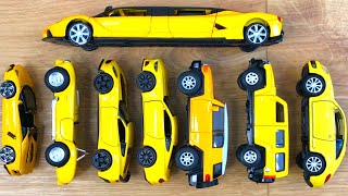 Showing Various Diecast Model Yellow Cars From The Floor - Yellow Cars