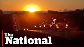 Convoy of evacuees moves through Fort Mac