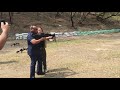 pnp chief ronald dela rosa firing a negev machine gun