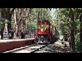 passneger trains arriving at beautiful cherukara railway station