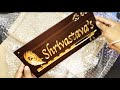 iCreations® Home Door Name Plate with Golden Acrylic Solid Letters with wooden pattern (6 x 12 Inch)