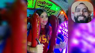 A woman who rode the sling shot ride loses her wig and briefly passes out | slingshot video
